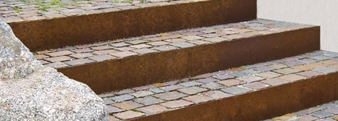 Garden steps built into the wall.