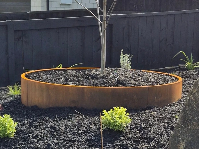 corten round planter folded edge